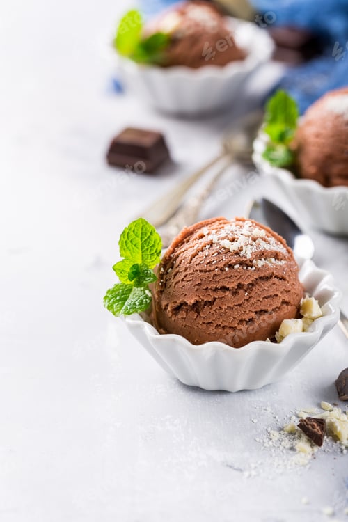 Preview: Chocolate ice cream in white bowl.