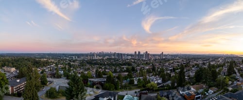 Preview: Panoramic View of Burnaby Skyline at Sunset with Vibrant Sky