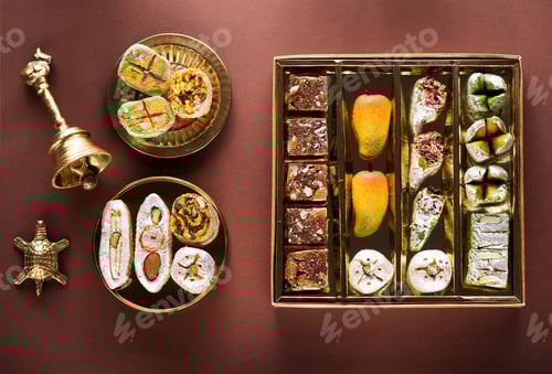 Preview: Indian sweets and Mithai in a box and a plate. Diwali festival concept