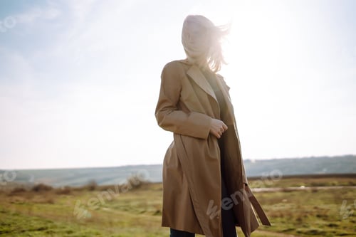Preview: Young woman enjoys a spring sunny day. People, lifestyle, travel, nature and vacations concept.