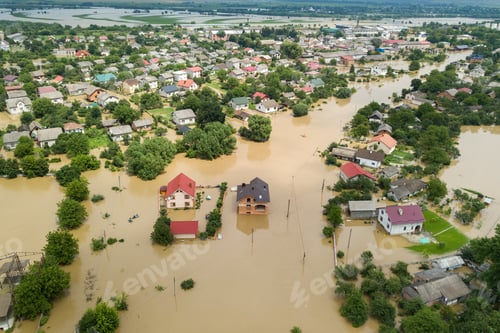 Preview: Aerial view of flooded houses with dirty water of Dnister river in Halych town, western Ukraine.