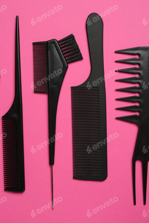Preview: Different hairdresser's tools on pink background, flat lay