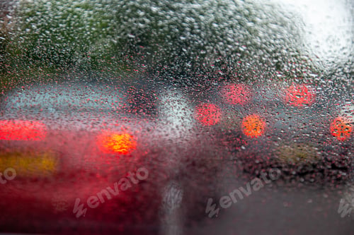 Preview: Driving with heavy rain on car windscreen