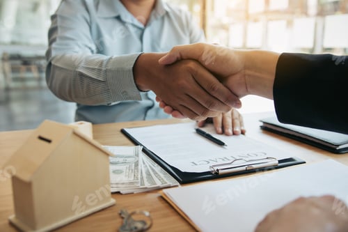 Preview: Home sales agents and buyers work on signing new homes and shaking hands.