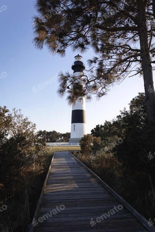 Preview: A wooden walkway pointing towards Bodie Island Lighthouse in North Carolina