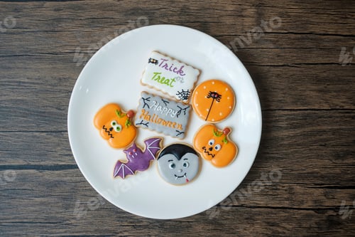 Preview: Festive Halloween Cookies on a White Plate