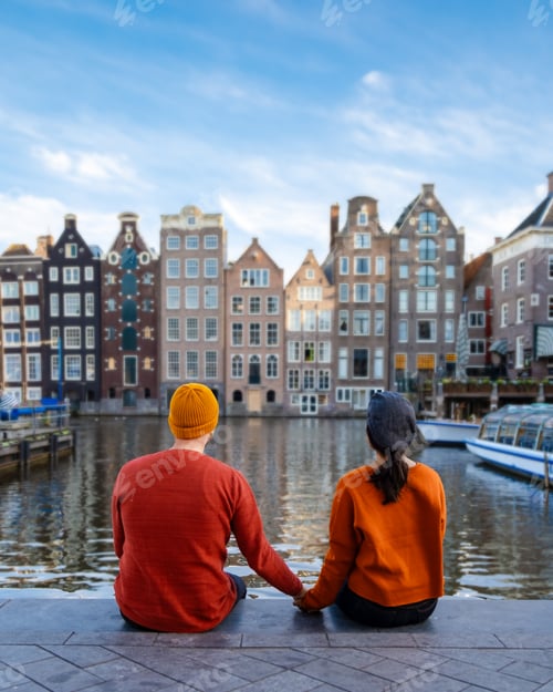 Preview: Amsterdam Netherlands during Autumn fall season , couple men and woman visit the city of Amsterdam