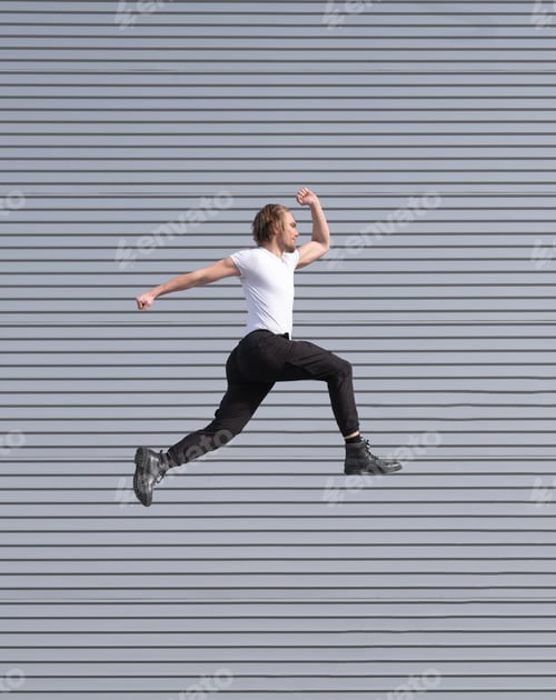 Preview: blond caucasian boy jumping doing parkour white t-shirt
