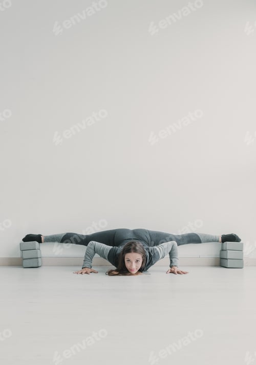 Preview: Flexible lady stretching in studio