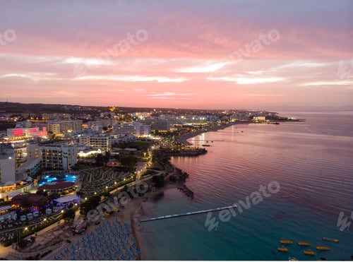 Preview: Aerial drone shot of the sunset above Protaras city