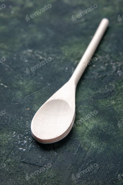 Preview: front close view white plastic spoon on a dark background plastic fork cutlery wood color food
