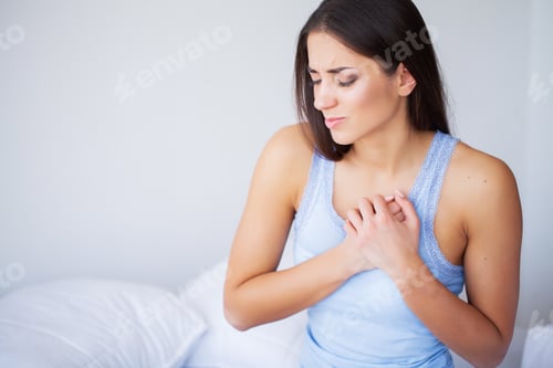 Preview: Heart Pain. Beautiful Woman Suffering From Pain In Chest. Health Issues