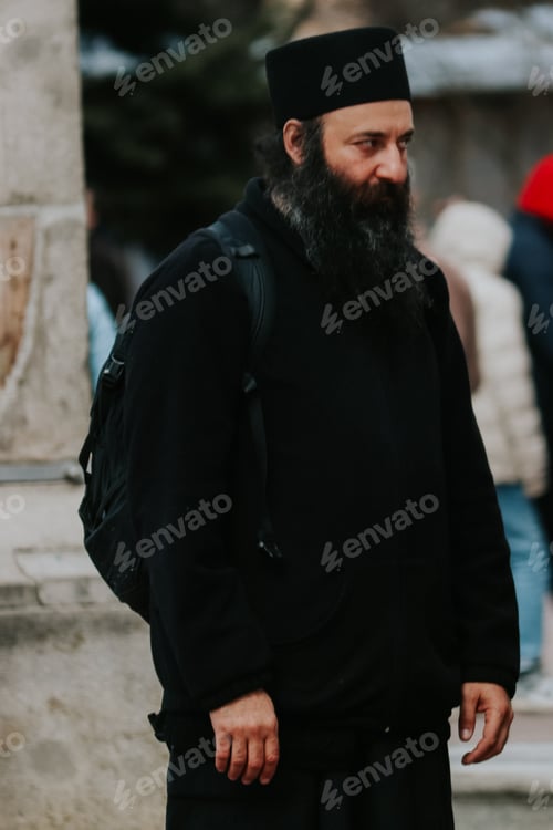 Bearded Man in Black Clothing Outdoors