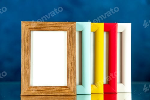 Preview: front view different picture frames with colored corners on a blue background family memory glass