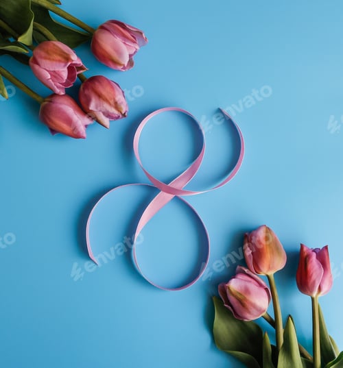 Preview: A bouquet of tulips and a pink ribbon in the form of number 8 on a blue background