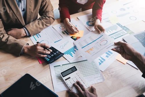 Preview: Startup business people teamwork calculating a valuation in workplace. top view shot