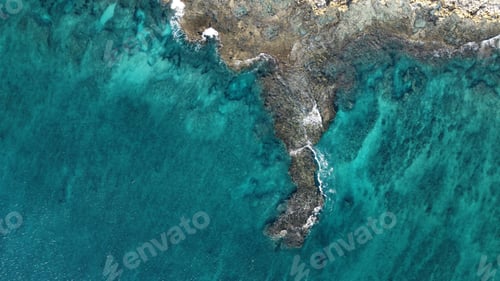 Preview: Aerial view of cliffs near a blue sea