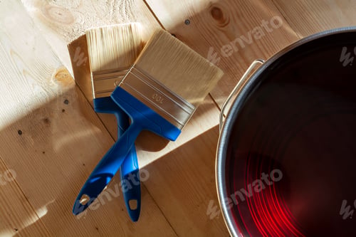 Preview: Two paintbrushes with varnish can for wood floor treatment