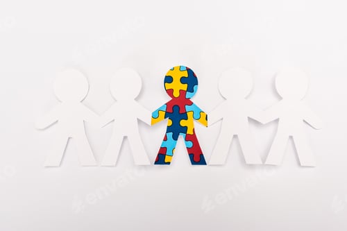 Preview: Top view of special kid with autism among another on white