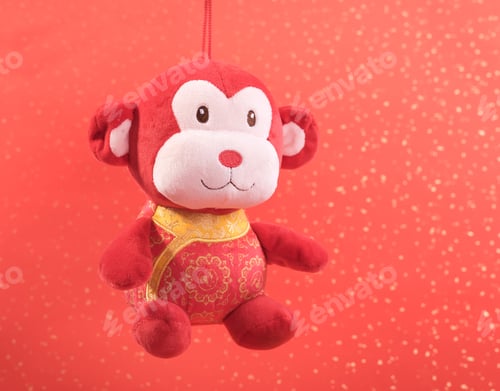 Preview: Chinese Lunar New Year Ornaments Toy Of Monkey On Festive Background