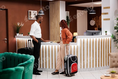 Preview: Young couple waiting to do check in