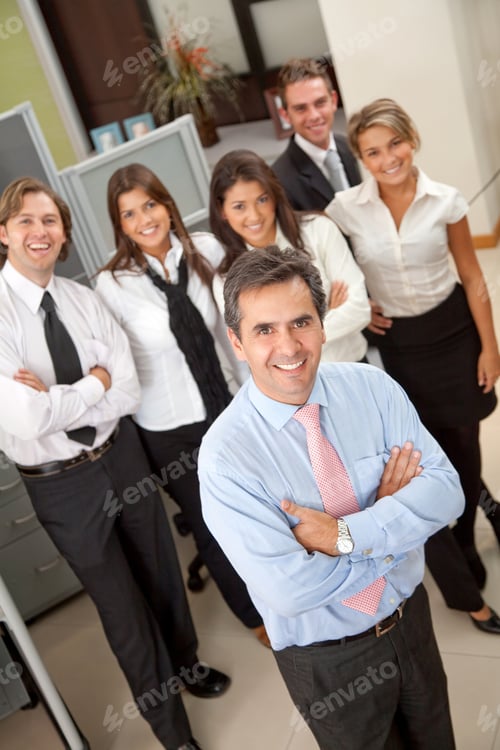 Preview: Group Of Business People At The Office Smiling