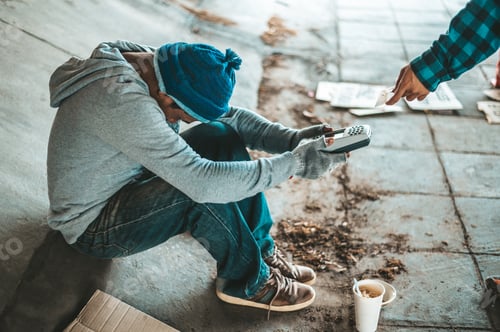 Preview: Beggars sitting under the overpass with a credit card and credit card swipe machine