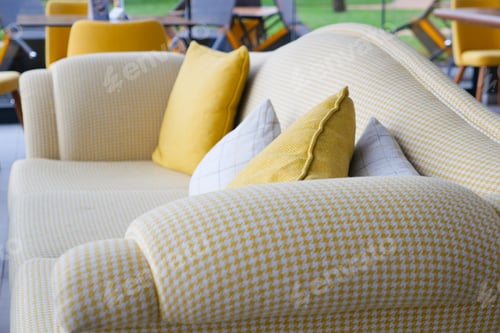 Preview: modern grey sofa with pillows in living room at home