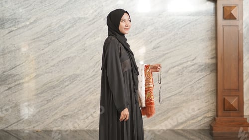 Preview: Muslim woman after worship at the mosque