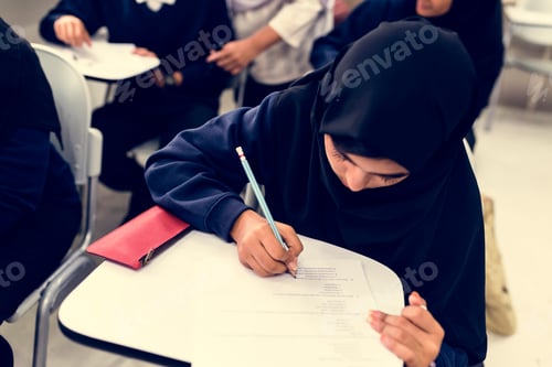 Preview: diverse muslim children studying in classroom
