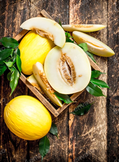 Preview: Sliced fresh melon in the old box.