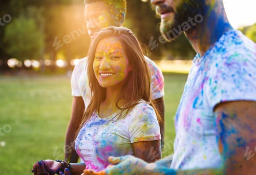 Preview: Friends playing with holi powder