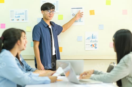 Preview: Young man presenting graph report with team, Business concepts.