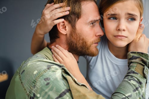 Preview: Masculine sad military man hugging her daughter indoors
