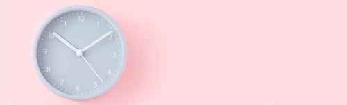 Preview: Gray alarm clock on a pink background with copy space, top view, long banner