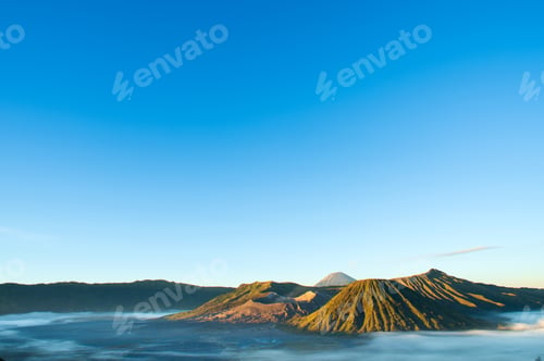 Preview: Sunrise over Mount Bromo reveals majestic volcanic ridges bathed in golden light