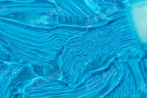 Preview: Brush and serum texture, clear gel bubbles on blue background. Skincare lotion face product swatch