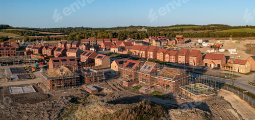 Preview: Aerial panoramia view directly above a new build housing estate in the UK