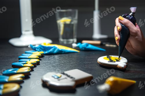 Preview: Preparation of handmade gingerbread with symbols of Ukraine, icing.