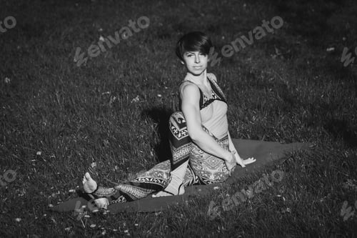 Preview: Yoga. The Girl In The Park Is Practicing Yoga