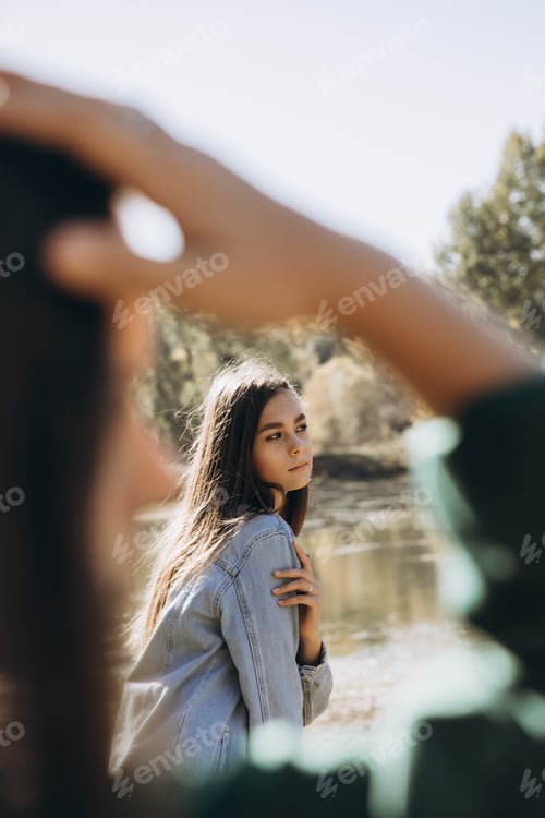 Preview: two teenage girls are walking in the park. girls friendship, lgbt