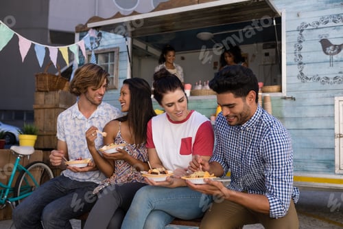 Preview: Friends interacting while having snacks