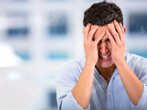 Preview: Stressed Business Man With A Headache At The Office
