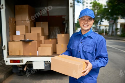 Preview: Delivery man with cardboard box