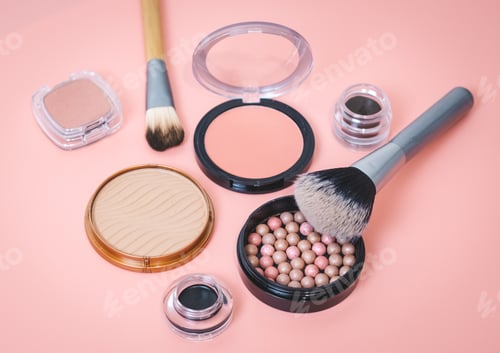 Preview: A set of female cosmetics on a pink background.