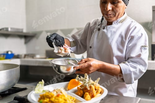Preview: Chef preparing ceviche in a seafood restaurant kitchen