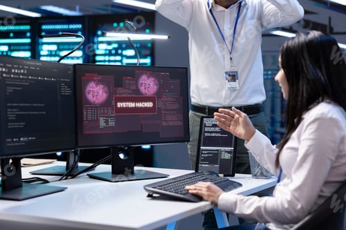 Preview: Team of developers in server hub frightened by hacker passing firewall