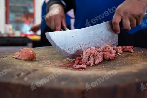 Preview: Preparation of carnitas taco at Mexican street stall