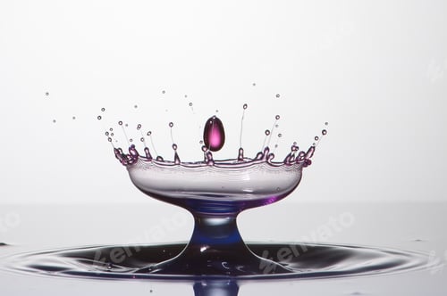Preview: Splash of colorful liquid with high speed flash