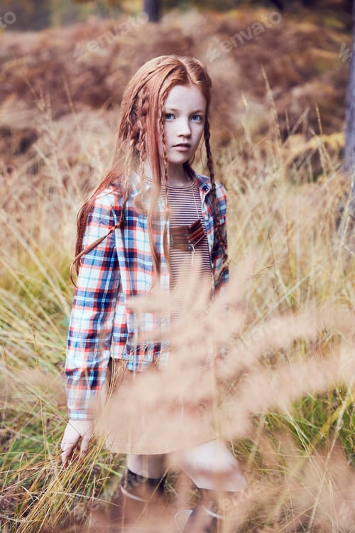 Preview: Portrait of young girl in rural setting